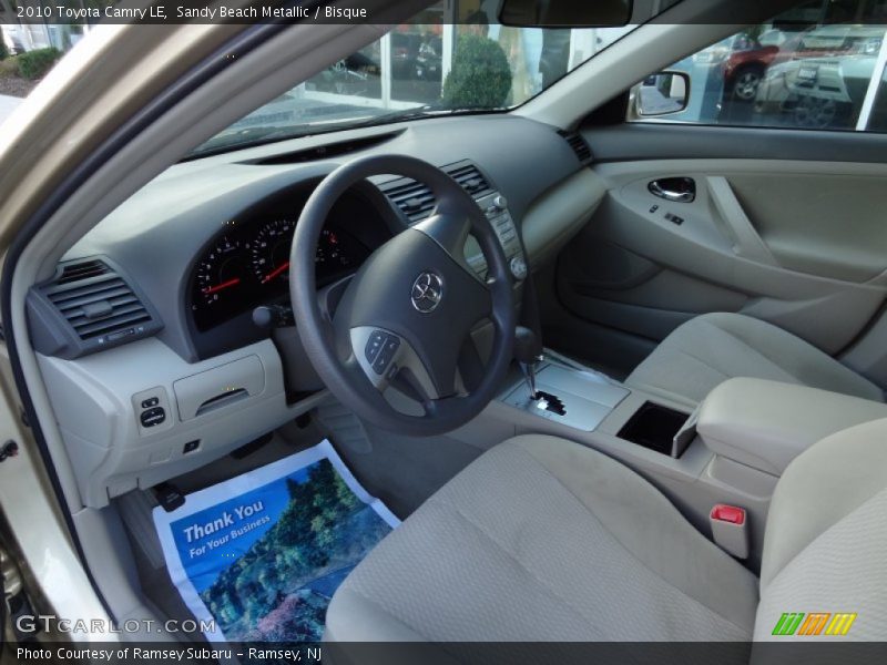 Sandy Beach Metallic / Bisque 2010 Toyota Camry LE