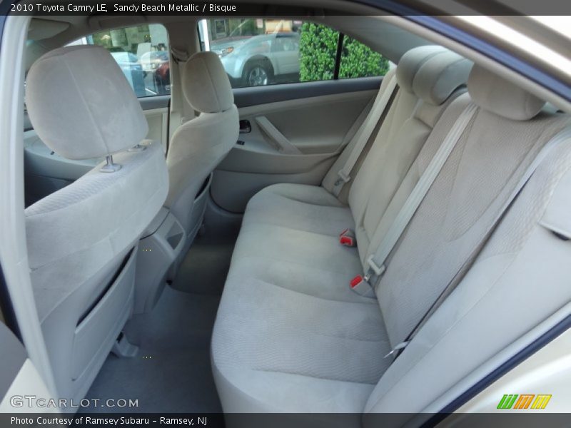 Sandy Beach Metallic / Bisque 2010 Toyota Camry LE