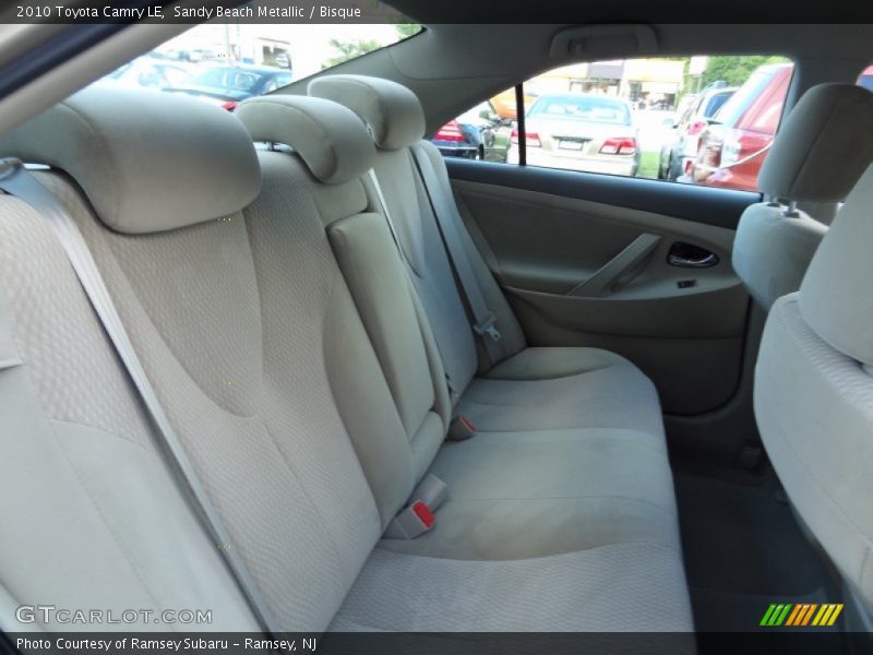 Sandy Beach Metallic / Bisque 2010 Toyota Camry LE