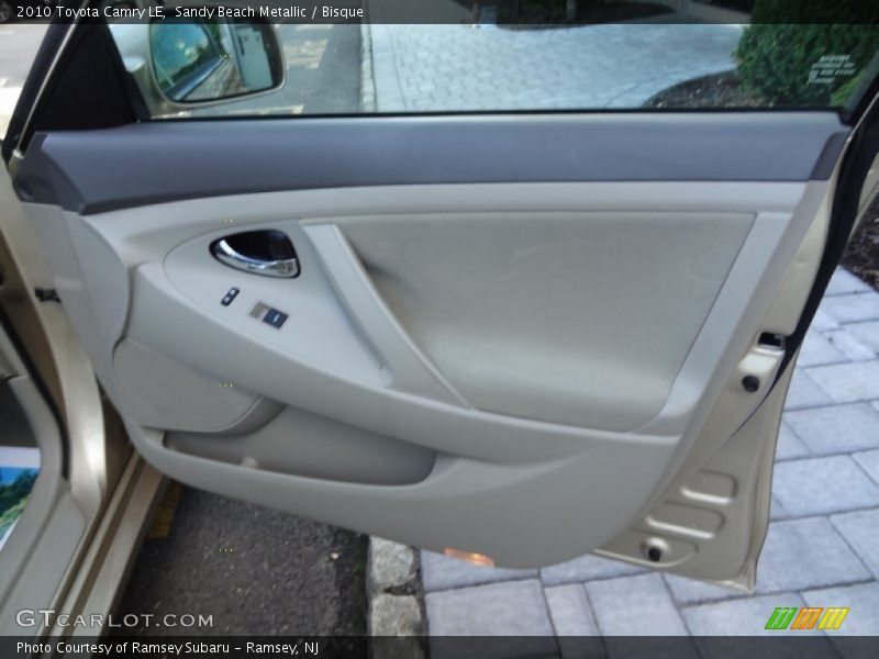 Sandy Beach Metallic / Bisque 2010 Toyota Camry LE