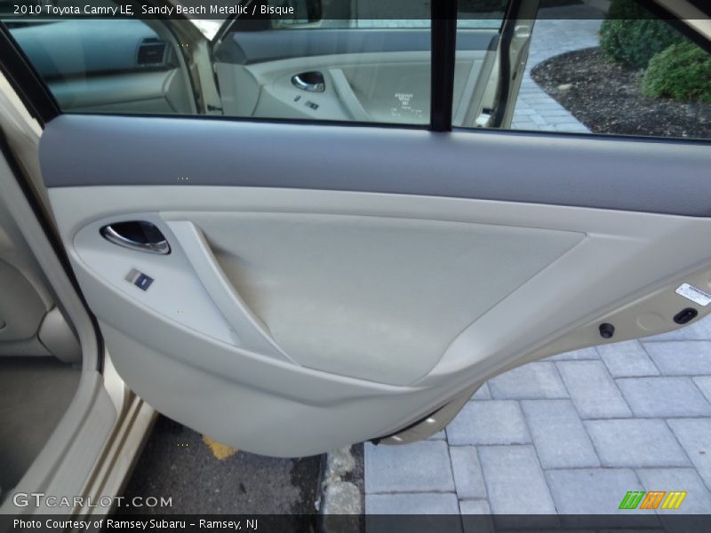 Sandy Beach Metallic / Bisque 2010 Toyota Camry LE