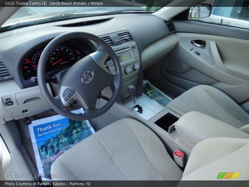 Sandy Beach Metallic / Bisque 2010 Toyota Camry LE