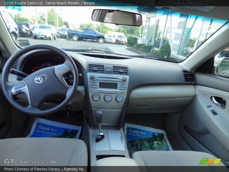 Sandy Beach Metallic / Bisque 2010 Toyota Camry LE