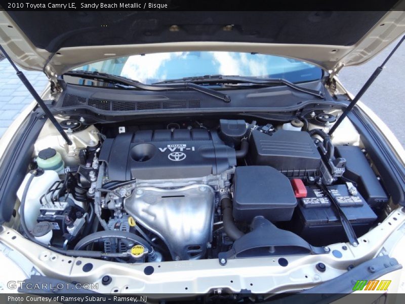 Sandy Beach Metallic / Bisque 2010 Toyota Camry LE