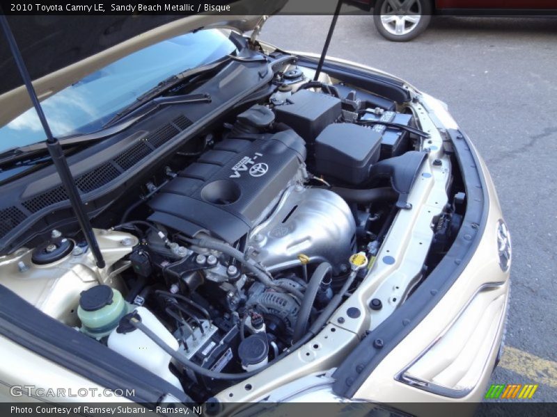 Sandy Beach Metallic / Bisque 2010 Toyota Camry LE