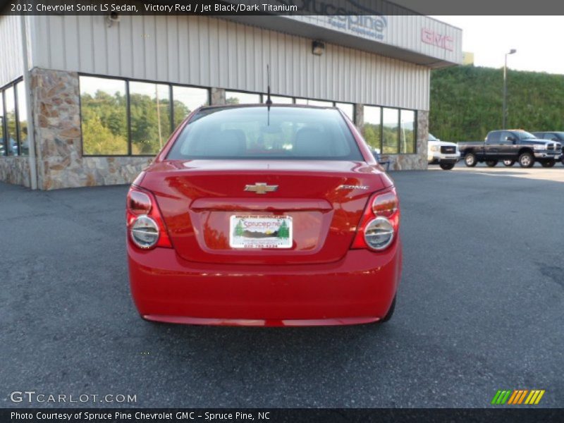 Victory Red / Jet Black/Dark Titanium 2012 Chevrolet Sonic LS Sedan