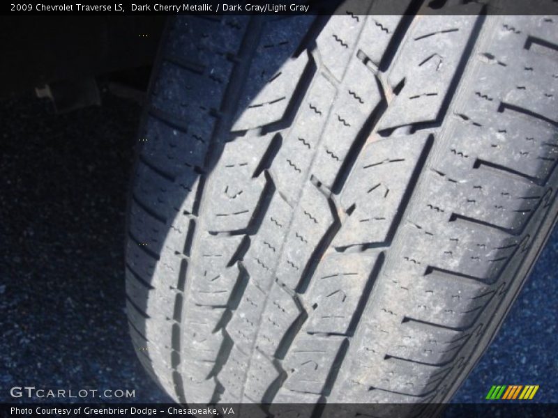 Dark Cherry Metallic / Dark Gray/Light Gray 2009 Chevrolet Traverse LS