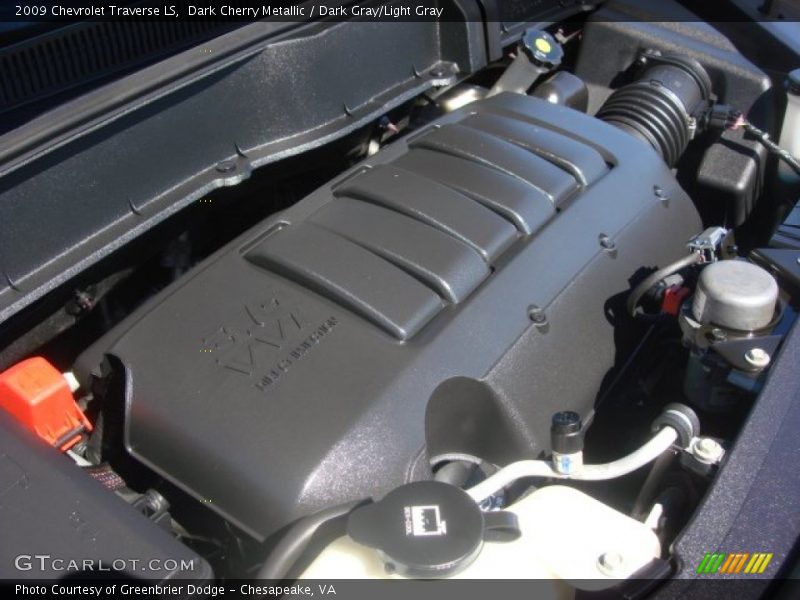 Dark Cherry Metallic / Dark Gray/Light Gray 2009 Chevrolet Traverse LS