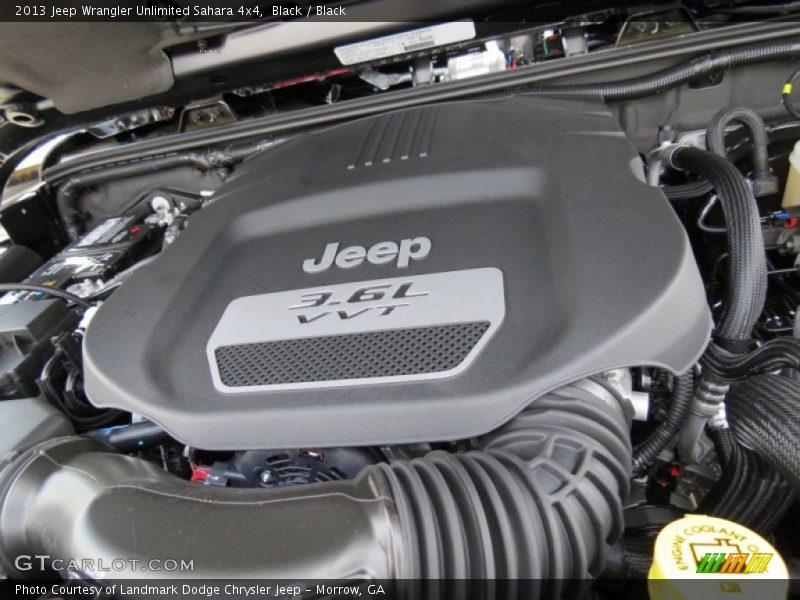 Black / Black 2013 Jeep Wrangler Unlimited Sahara 4x4