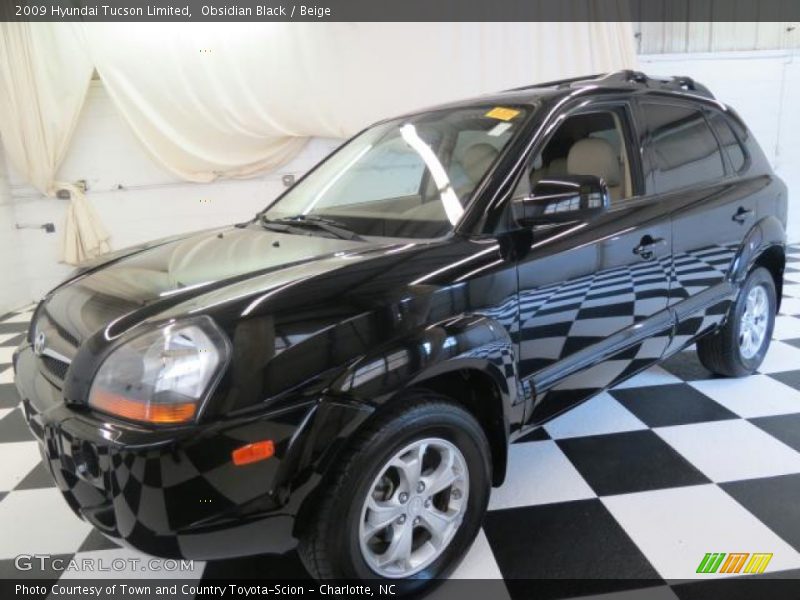 Obsidian Black / Beige 2009 Hyundai Tucson Limited