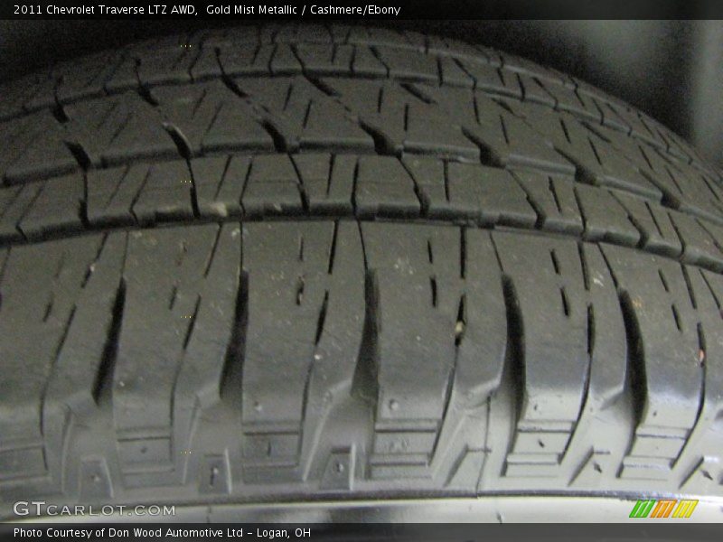 Gold Mist Metallic / Cashmere/Ebony 2011 Chevrolet Traverse LTZ AWD