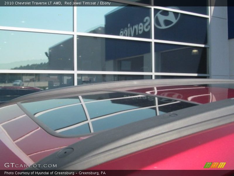 Red Jewel Tintcoat / Ebony 2010 Chevrolet Traverse LT AWD