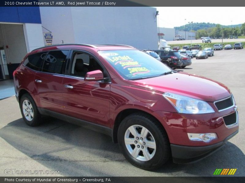 Red Jewel Tintcoat / Ebony 2010 Chevrolet Traverse LT AWD