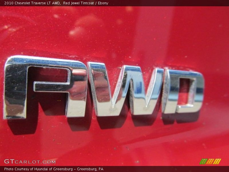 Red Jewel Tintcoat / Ebony 2010 Chevrolet Traverse LT AWD