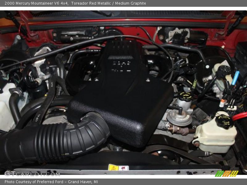 Toreador Red Metallic / Medium Graphite 2000 Mercury Mountaineer V6 4x4