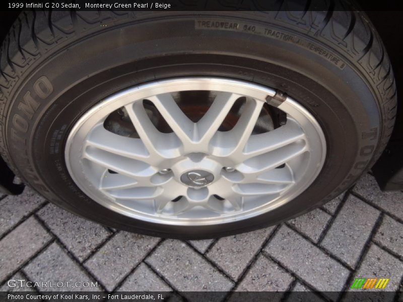 Monterey Green Pearl / Beige 1999 Infiniti G 20 Sedan