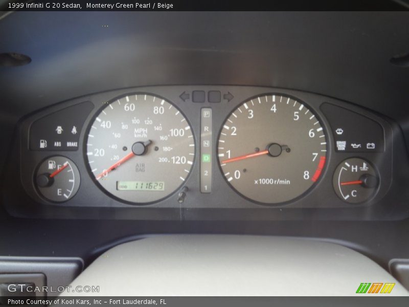 Monterey Green Pearl / Beige 1999 Infiniti G 20 Sedan