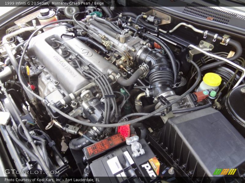 Monterey Green Pearl / Beige 1999 Infiniti G 20 Sedan