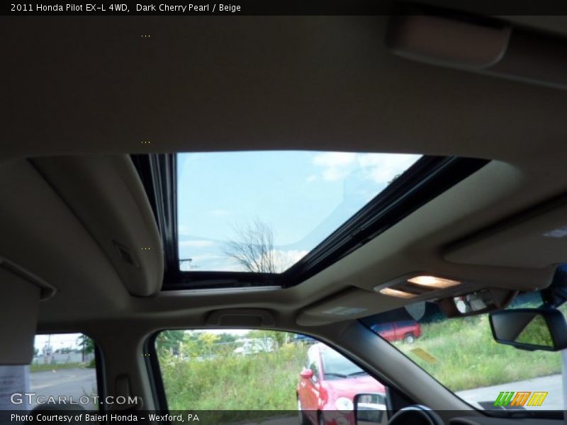 Dark Cherry Pearl / Beige 2011 Honda Pilot EX-L 4WD