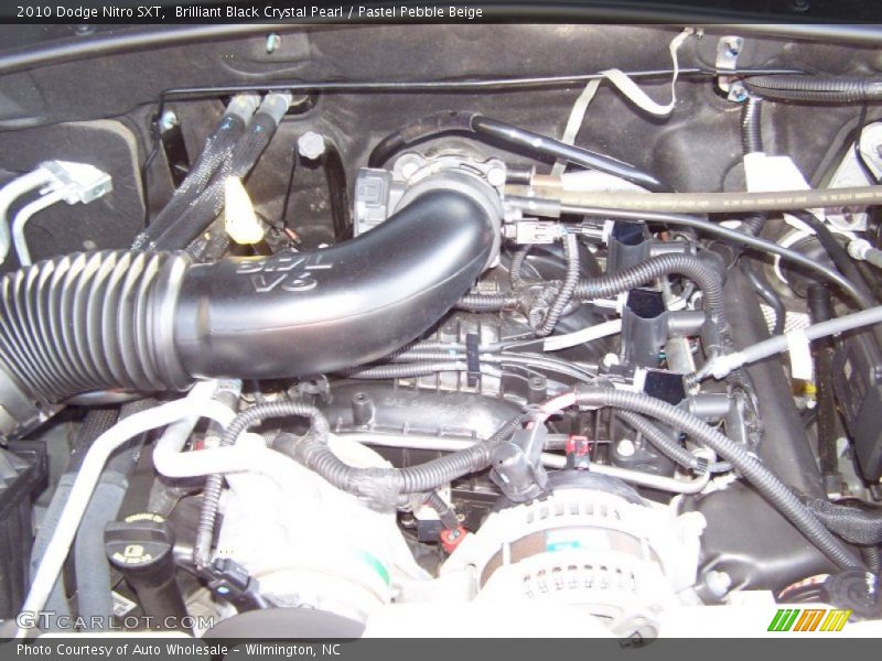 Brilliant Black Crystal Pearl / Pastel Pebble Beige 2010 Dodge Nitro SXT
