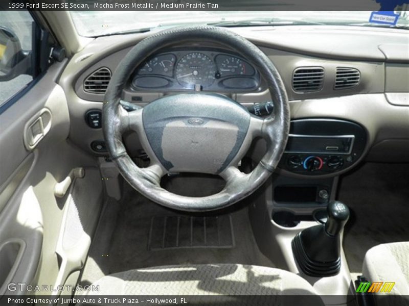 Mocha Frost Metallic / Medium Prairie Tan 1999 Ford Escort SE Sedan
