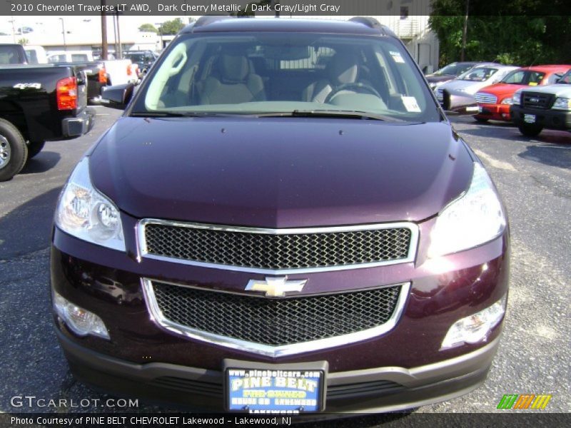 Dark Cherry Metallic / Dark Gray/Light Gray 2010 Chevrolet Traverse LT AWD
