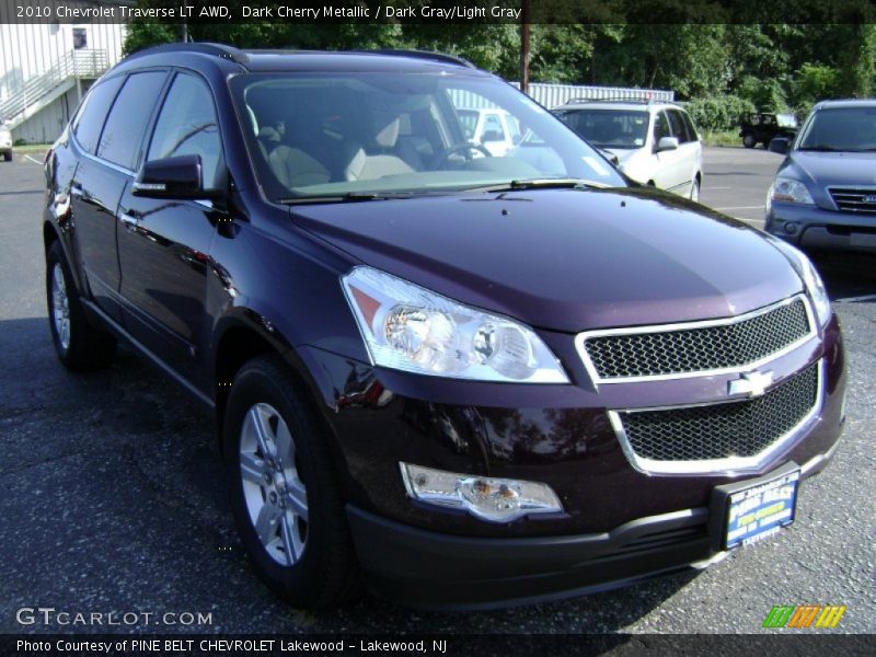 Dark Cherry Metallic / Dark Gray/Light Gray 2010 Chevrolet Traverse LT AWD