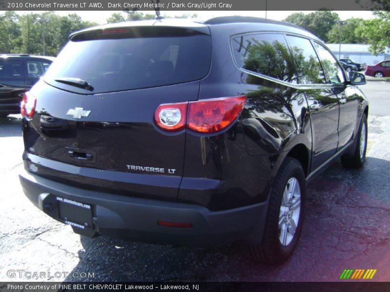 Dark Cherry Metallic / Dark Gray/Light Gray 2010 Chevrolet Traverse LT AWD