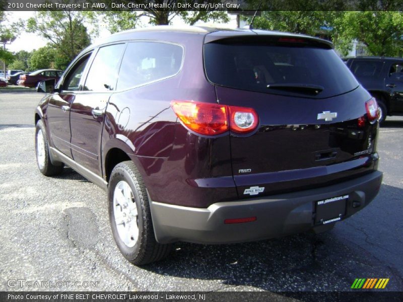 Dark Cherry Metallic / Dark Gray/Light Gray 2010 Chevrolet Traverse LT AWD