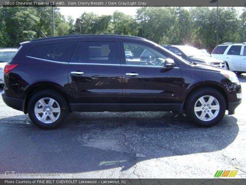 Dark Cherry Metallic / Dark Gray/Light Gray 2010 Chevrolet Traverse LT AWD