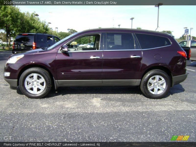Dark Cherry Metallic / Dark Gray/Light Gray 2010 Chevrolet Traverse LT AWD