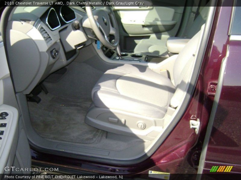 Dark Cherry Metallic / Dark Gray/Light Gray 2010 Chevrolet Traverse LT AWD
