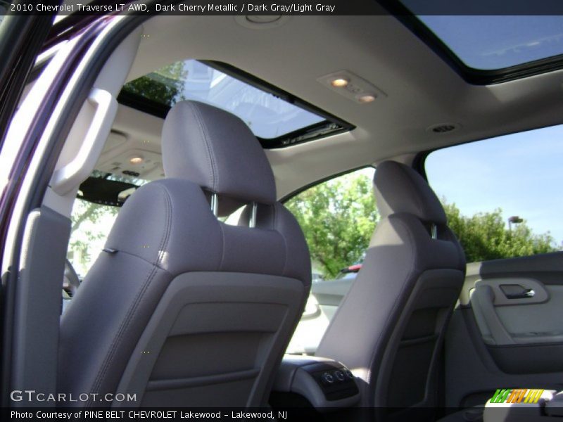 Dark Cherry Metallic / Dark Gray/Light Gray 2010 Chevrolet Traverse LT AWD
