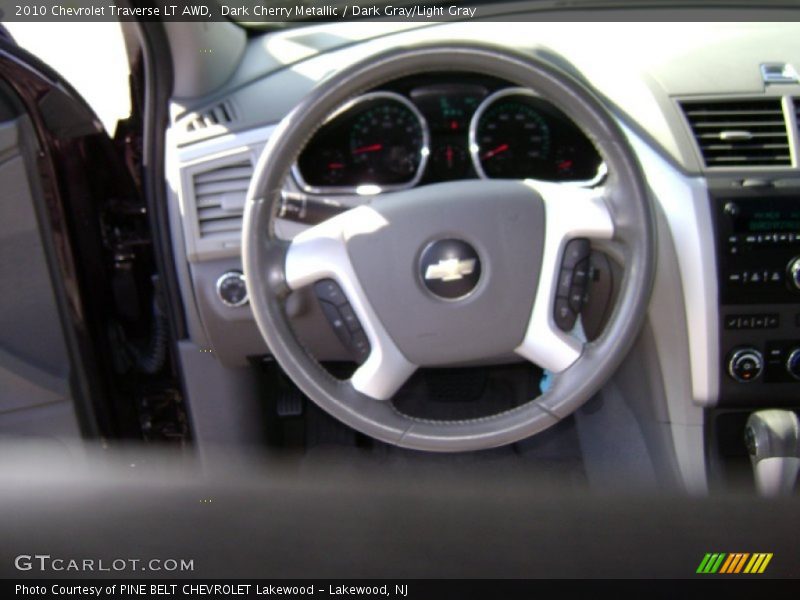 Dark Cherry Metallic / Dark Gray/Light Gray 2010 Chevrolet Traverse LT AWD