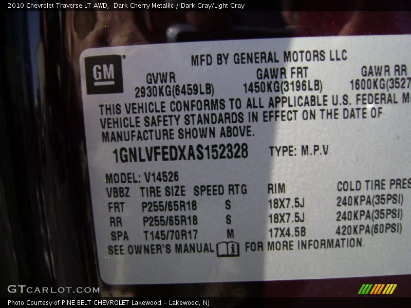 Dark Cherry Metallic / Dark Gray/Light Gray 2010 Chevrolet Traverse LT AWD