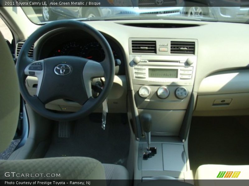 Aloe Green Metallic / Bisque 2011 Toyota Camry LE