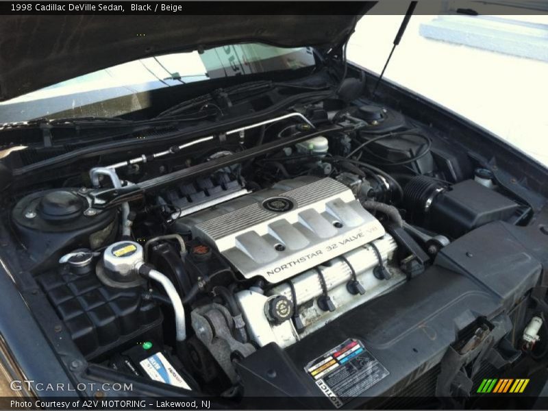 Black / Beige 1998 Cadillac DeVille Sedan
