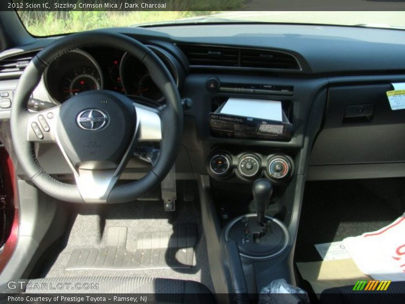 Sizzling Crimson Mica / Dark Charcoal 2012 Scion tC