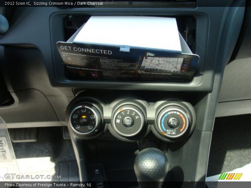 Sizzling Crimson Mica / Dark Charcoal 2012 Scion tC