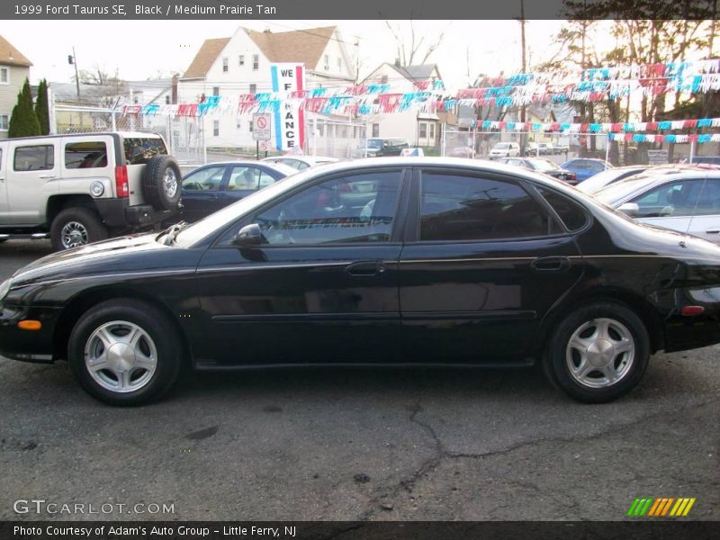 Black / Medium Prairie Tan 1999 Ford Taurus SE