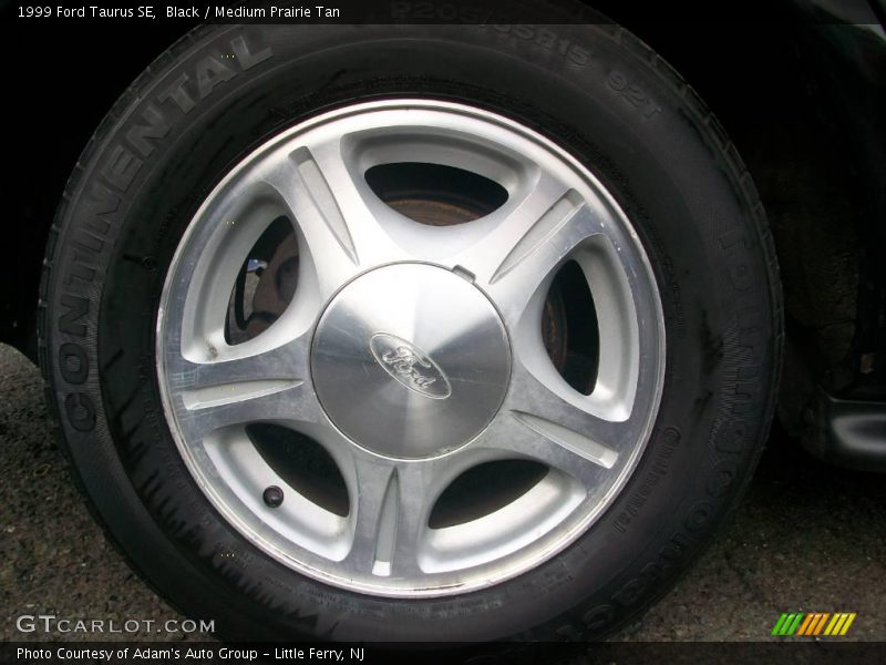 Black / Medium Prairie Tan 1999 Ford Taurus SE