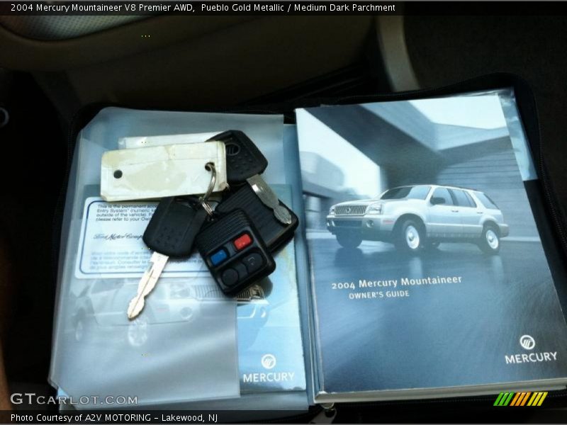 Pueblo Gold Metallic / Medium Dark Parchment 2004 Mercury Mountaineer V8 Premier AWD