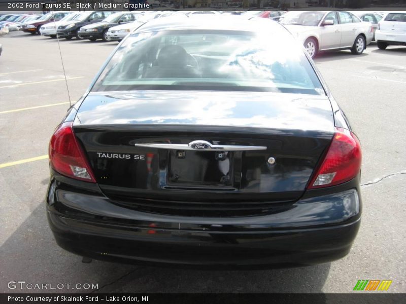 Black / Medium Graphite 2002 Ford Taurus SE