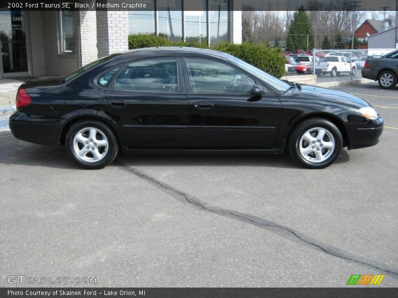 Black / Medium Graphite 2002 Ford Taurus SE