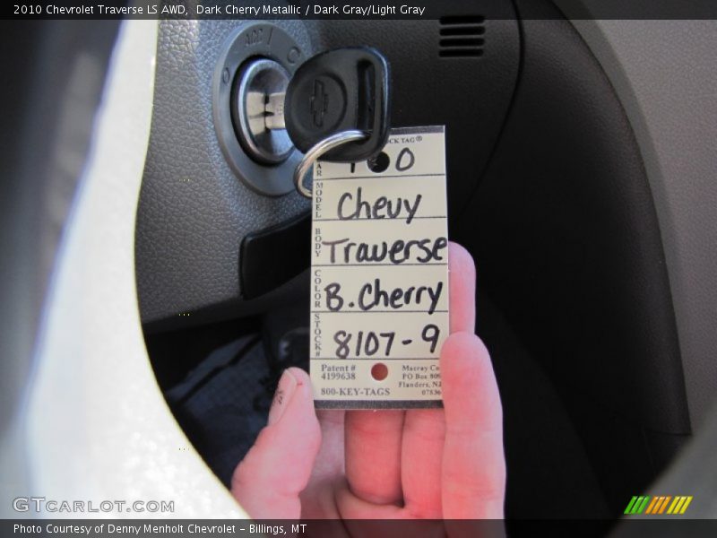 Dark Cherry Metallic / Dark Gray/Light Gray 2010 Chevrolet Traverse LS AWD