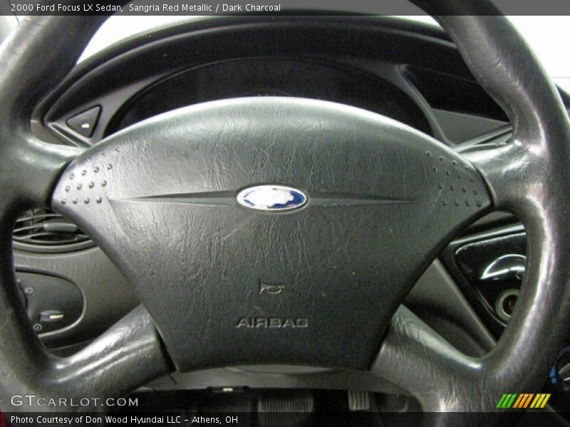 Sangria Red Metallic / Dark Charcoal 2000 Ford Focus LX Sedan