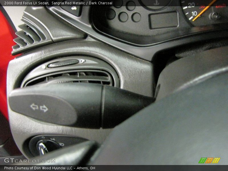Sangria Red Metallic / Dark Charcoal 2000 Ford Focus LX Sedan