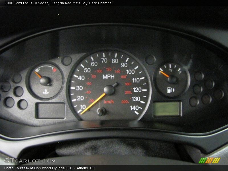 Sangria Red Metallic / Dark Charcoal 2000 Ford Focus LX Sedan