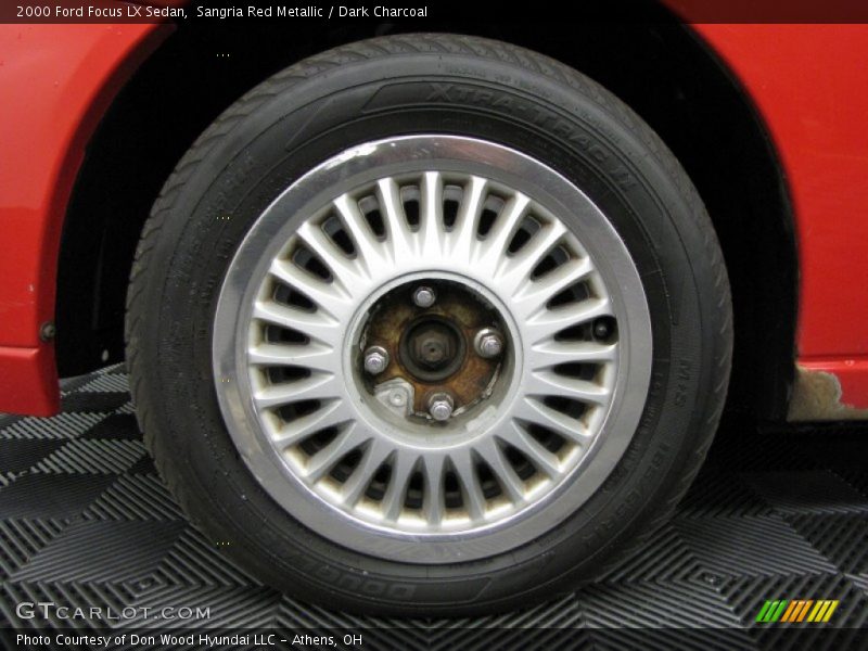 Sangria Red Metallic / Dark Charcoal 2000 Ford Focus LX Sedan