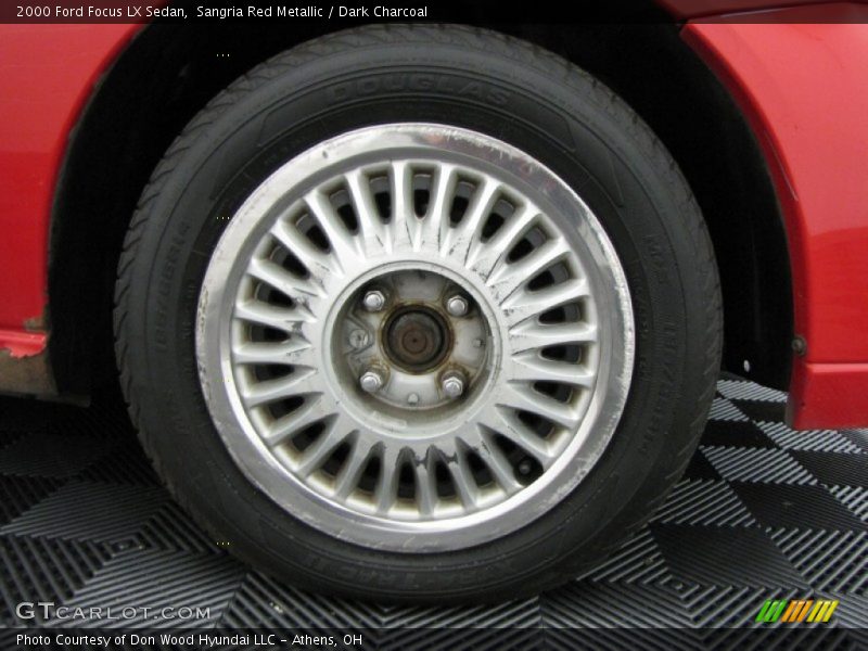 Sangria Red Metallic / Dark Charcoal 2000 Ford Focus LX Sedan